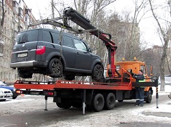 Погрузка автомобиля на эвакуатор: советы и правила выполнения работ